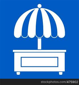 Shopping counter with umbrella icon white isolated on blue background vector illustration. Shopping counter with umbrella icon white