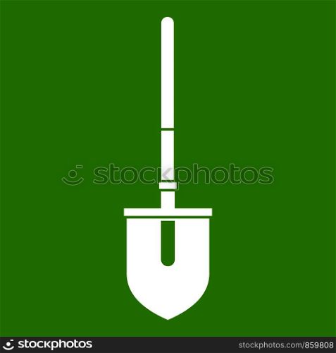 Shovel icon white isolated on green background. Vector illustration. Shovel icon green