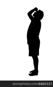 Side profile portrait silhouette of a barefoot man looking upward at high object
