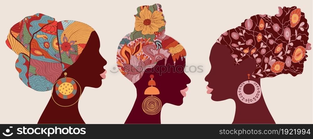 Silhouette faces in profile African or African American women with ethnic or tribal hair decorations and with large earrings. African culture. Racial equality concept