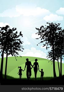 Silhouette of a family walking outside in the countryside