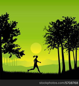 Silhouette of a female jogging in the countryside