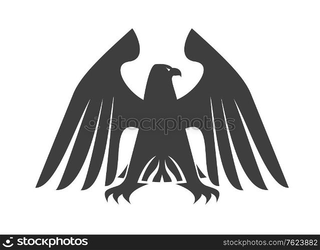 Silhouette of a majestic eagle standing with outspread wings and feet and flowing wing feathers looking to the right for heraldry design