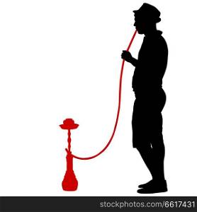 Silhouette of a man smoking a hookah standing beside him.. Silhouette of a man smoking a hookah standing beside him