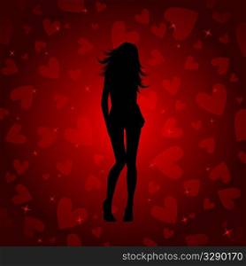 Silhouette of a sexy female on a heart background