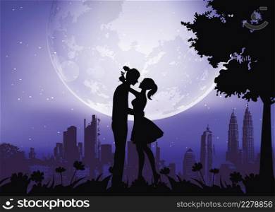 Silhouette of couple kissing under moon