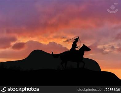 Silhouette Of Cowboy With Lasso On Rearing Horse