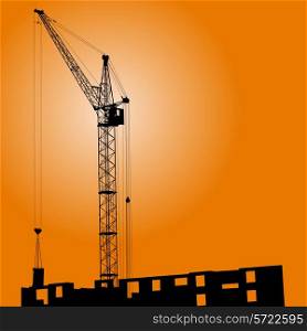 Silhouette of crane on a sunset on a building