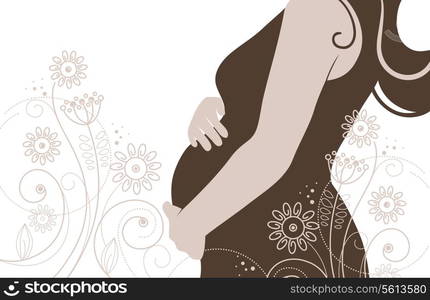 Silhouette of pregnant woman in flowers