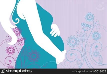 Silhouette of pregnant woman in flowers