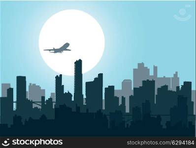 Silhouette of the city at night at sunset, and the aircraft
