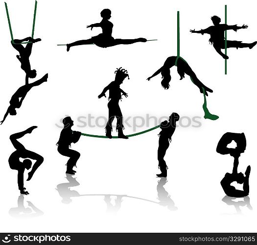 Silhouettes of circus performers