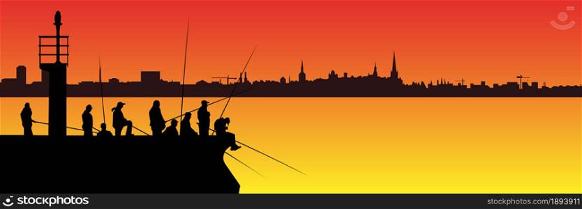 Silhouettes of fishermen with fishing rods on pier with lighthouse and long city skyline on background of sunset. Lots of people with long fishing rods with copy space.