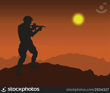 silhouettes of man standing on mountain holding gun