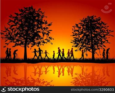 Silhouettes of people walking in the countryside