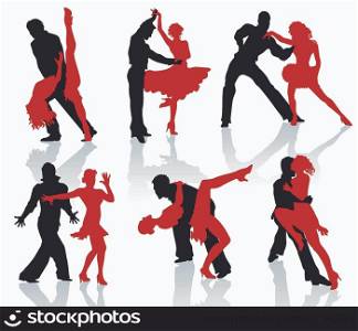 Silhouettes of the pairs dancing ballroom dances. Tango.