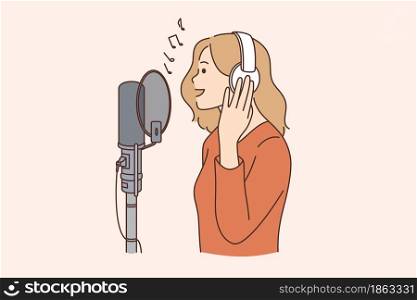 Singer, blogger and radio program concept. Young smiling woman in headphones standing singing song or talking on microphone in studio vector illustration . Singer, blogger and radio program concept