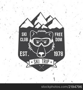 Ski club concept with bear. Vector ski club retro badge. Concept for shirt, print, seal or stamp. Ski club - wild bear. Typography design- stock vector. Family vacation, activity or travel. For logo design, patches or badges.. Ski club concept with bear.