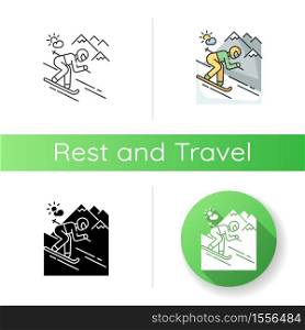 Skiing icon. Linear black and RGB color styles. Winter vacation, seasonal extreme tourism. Active recreation at alpine ski resort. Sportsman skiing downhill isolated vector illustrations. Skiing icon