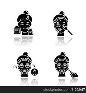 Skin care procedures drop shadow black glyph icons set. Applying exfoliating cream. Using thermal mask to open up pores. Liquid mask for facial treatment. Female beauty. Isolated vector illustrations