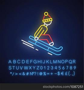 Sledding neon light icon. Winter extreme sport, risky activity and adventure. Sleigh riding. Person sledging. Glowing sign with alphabet, numbers and symbols. Vector isolated illustration