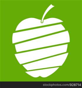 Sliced apple icon white isolated on green background. Vector illustration. Sliced apple icon green