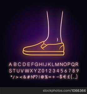Slip ons neon light icon. Women and men stylish footwear design. Unisex casual flats, modern comfortable canvas shoes. Glowing sign with alphabet, numbers and symbols. Vector isolated illustration