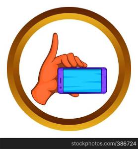 Smartphone in hand vector icon in golden circle, cartoon style isolated on white background. Smartphone in hand vector icon