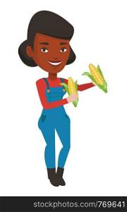 Smiling african-american farmer collecting corn. Happy female farmer holding a corn cob. Cheerful farmer standing with a corn cob in hands. Vector flat design illustration isolated on white background. Farmer collecting corn vector illustration.