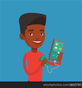 Smiling african-american man recharging his smartphone with mobile phone portable battery. Young man holding a mobile phone and battery power bank. Vector flat design illustration. Square layout.. Man reharging smartphone from portable battery.
