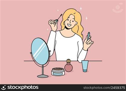 Smiling girl sit at table doing makeup put mascara. Happy young woman look in mirror apply beauty cosmetics products. Daily routine and preparation. Cosmetology. Vector illustration. . Smiling girl doing makeup looking in mirror 