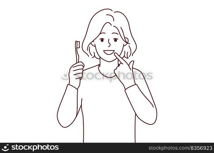 Smiling girl with toothbrush show at white clean teeth. Happy child recommend teeth brushing and oral care. Dental care concept. Vector illustration. . Smiling girl point at clean teeth 