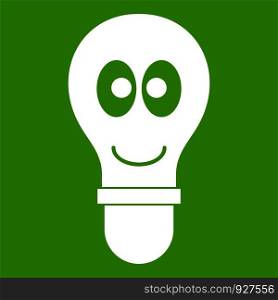 Smiling light bulb with eyes icon white isolated on green background. Vector illustration. Smiling light bulb with eyes icon green