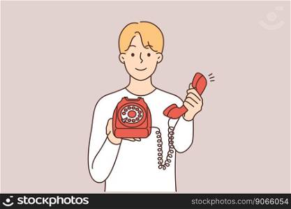 Smiling man holding retro landline phone offer to make call. Happy guy with corded telephone suggest talking. Vector illustration. . Smiling man with corded phone offer to make call 