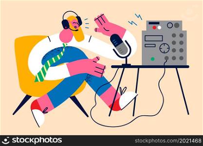Smiling man in headphones talk on radio on microphone have session with listeners. Happy male presenter or host speak on podcast on mic in air. Live broadcast concept. Flat vector illustration. . Smiling man talk on radio on microphone