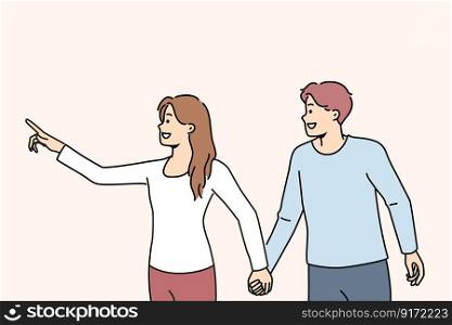 Smiling woman holding man by hand showing something forward. Happy couple holding hands point with finger on empty space aside. Vector illustration. . Smiling woman holding man by hand pointing forward 