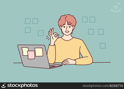 Smiling young man sit at table work on laptop show thumb up. Happy male employee recommend online program engaged in creative thinking. Vector illustration.. Smiling man show thumb up working on laptop
