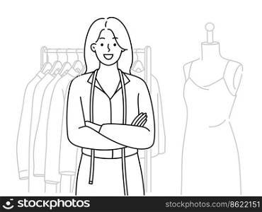 Smiling young woman designer standing near clothes collection on rack. Happy female dressmaker or seamstress posing near apparel in workshop. Vector illustration. . Smiling female designer standing near apparel 