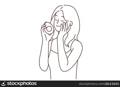 Smiling young woman holding avocado touch healthy skin after organic cosmetics. Happy girl enjoy natural beauty products with fruit oil. Cosmetology and skincare. Vector illustration. . Smiling woman touch skin hold avocado in hands 