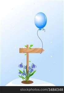 snowdrops and blue balloon on a wooden pointer
