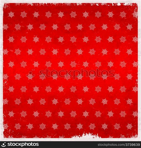 Snowflake pattern on red aged grungy card
