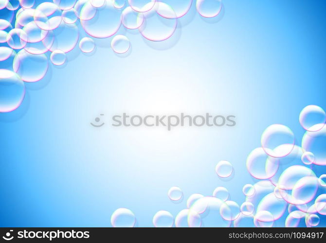 Soap bubbles blue background with rainbow colored airy foam