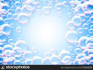 Soap bubbles blue background with rainbow colored airy foam round frame