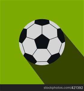 Soccer ball flat icon on a green background. Soccer ball flat icon