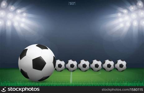 Soccer football ball and green grass of soccer field stadium background. Vector illustration.