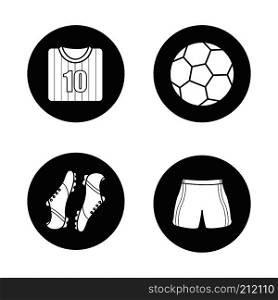 Soccer icons set. Football shirt, boots and shorts, ball. Soccer player's uniform. Vector white silhouettes illustrations in black circles. Soccer icons set