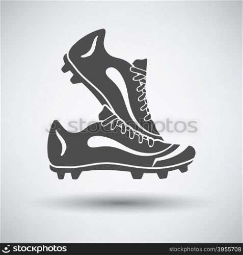 Soccer pair of boots icon on gray background with round shadow. Vector illustration.. Soccer pair of boots