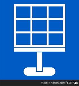 Solar battery icon white isolated on blue background vector illustration. Solar battery icon white