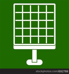 Solar panel icon white isolated on green background. Vector illustration. Solar panel icon green