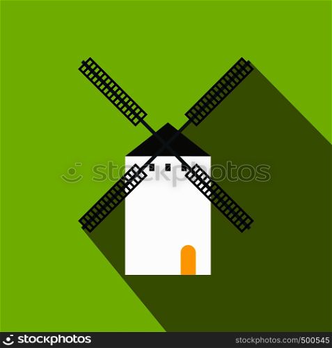 Spanish windmill icon in flat style on a green background . Spanish windmill icon, flat style